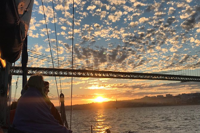 2 Hour Lisbon Sunset and Wine Sailing Tour - Portuguese wine, conversation, and the onboard mood