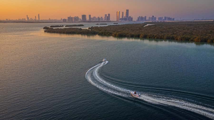 Abu Dhabi: Yas Island Self-Driving Guided Speedboat Tour - Yas Links, Ferrari World, and the best photo angles