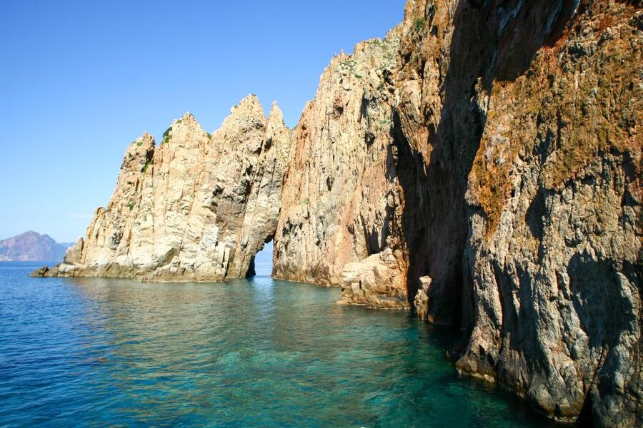 Ajaccio/Porticcio: Scandola Nature Reserve Guided Boat Tour - The red cliffs of the Calanche de Piana