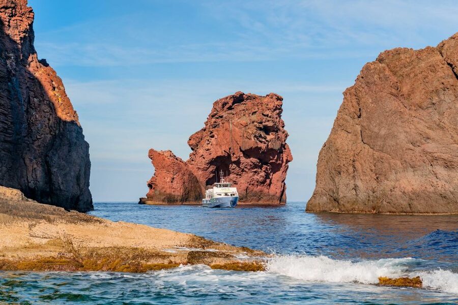Ajaccio/Porticcio: Scandola Nature Reserve Guided Boat Tour - Capo Rosso and its coastal tower