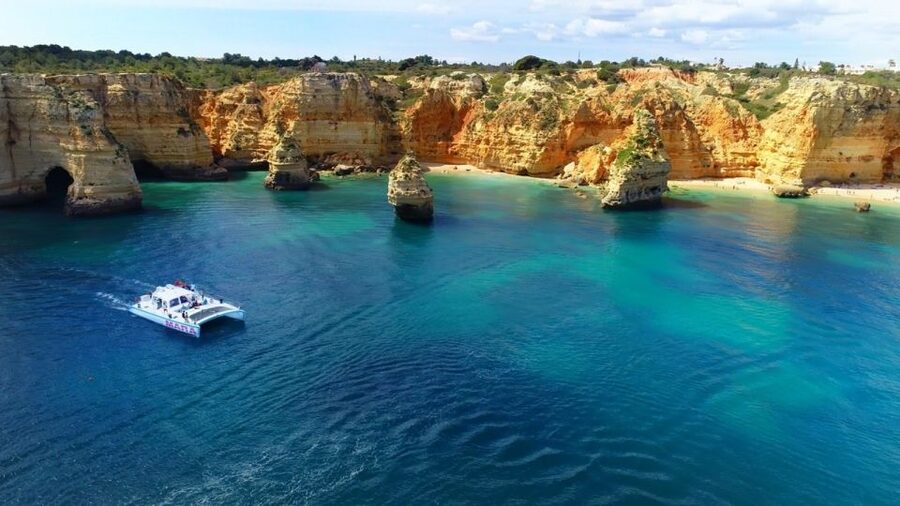 Albufeira: Catamaran Cruise with BBQ & Open Bar on the Beach - The Dinghy Transfer and Beach Arrival