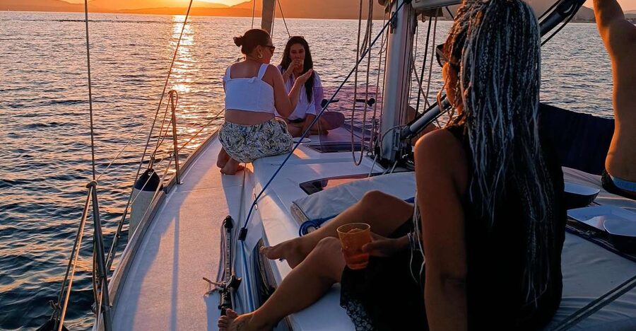 Alghero: Sunset Sailing Aperitif Experience - Sardinian Snacks, Spritz, and Music on the Water