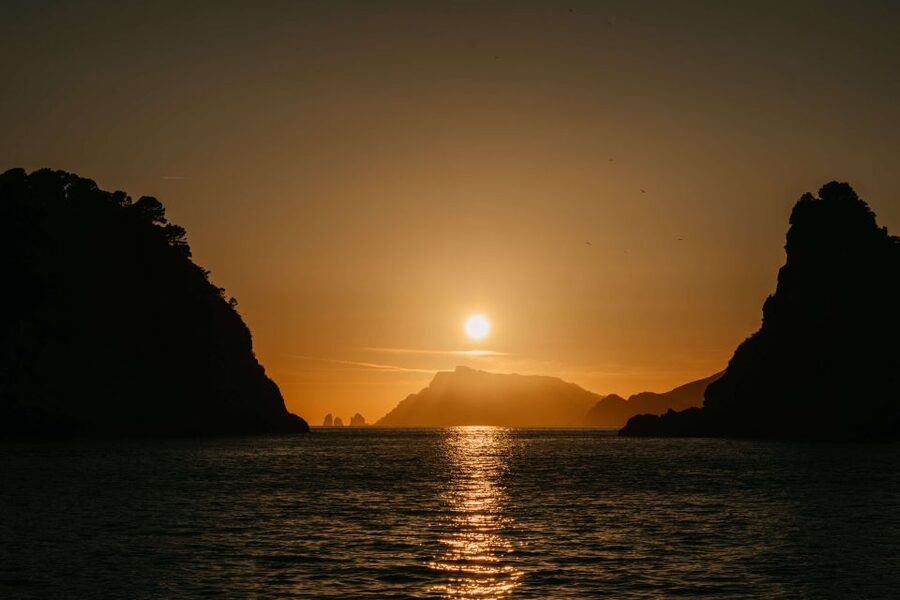 Amalfi Coast: Sunset Boat Tour with Fruit & Drinks - Who should book this Amalfi sunset boat tour?