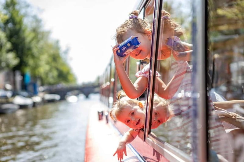 Amsterdam: 75 Minute City Canal Cruise with Audio Guide - Departure points, timing, and accessibility