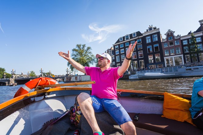 Amsterdam All-Inclusive 90-Minutes Heated Cruise by Captain Jack - Central Station and the old harbor front