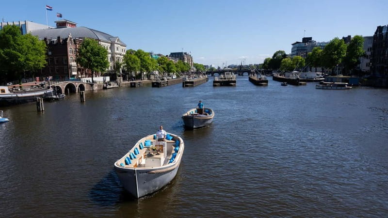 Amsterdam: Canal Cruise in Open Boat with Drink Option - Why seeing Amsterdam from the canals works so well