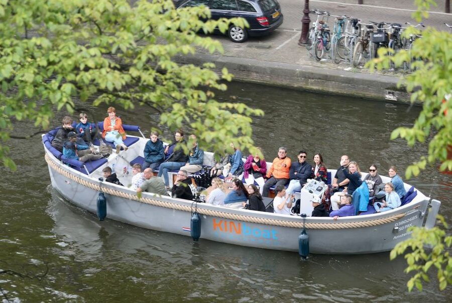 Amsterdam: Canal Cruise in Open Boat with Drink Option - The open boat, drinks, and comfort