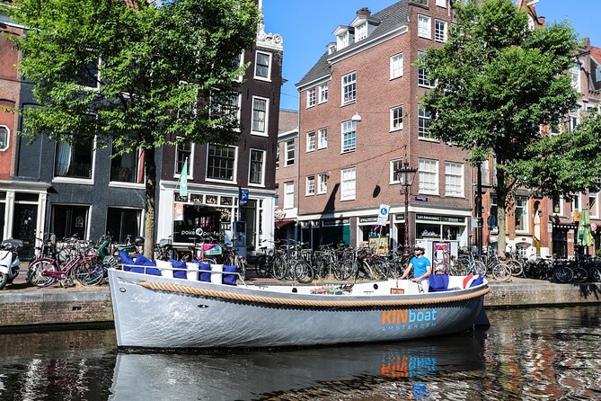 Amsterdam Canal Cruise in Open Boat with Unlimited Drinks Option - Canal turns, bridges, and photo opportunities
