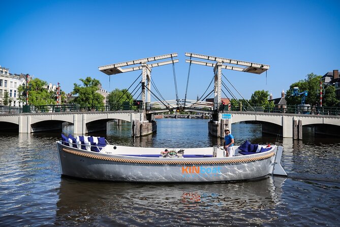 Amsterdam Canal Cruise in Open Boat with Unlimited Drinks Option - Passing the Hermitage Museum