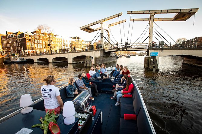 Amsterdam Canal Cruise With Live Guide and Unlimited Drinks - Following the Amstel toward the old city