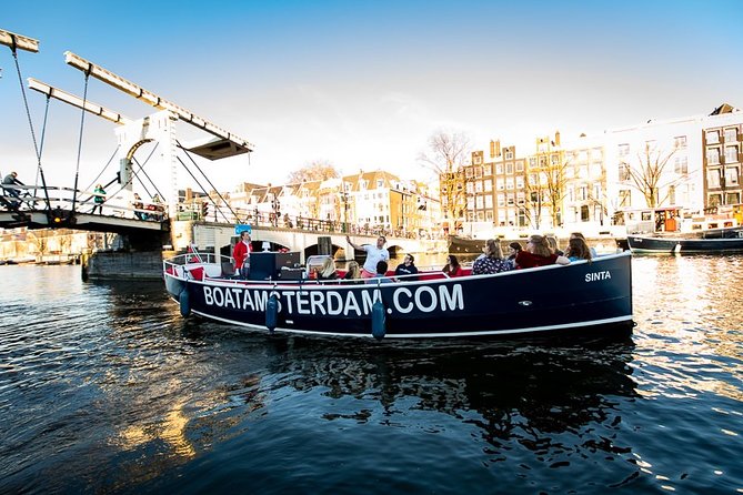 Amsterdam Canal Cruise With Live Guide and Unlimited Drinks - Herengracht, Prinsengracht, and the canal houses