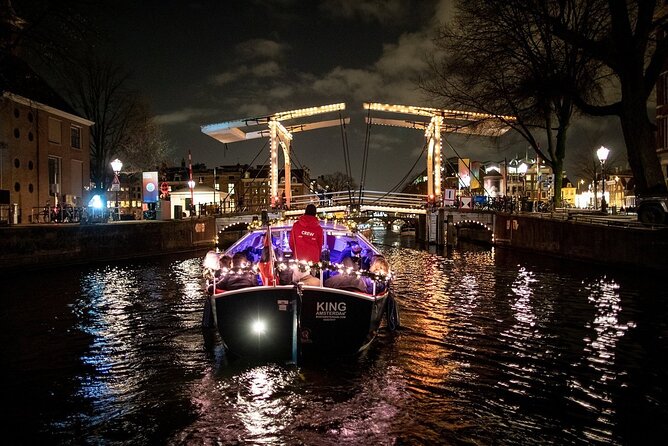 Amsterdam Canal Cruise With Live Guide and Unlimited Drinks - The Jordaan, museums, and small landmarks