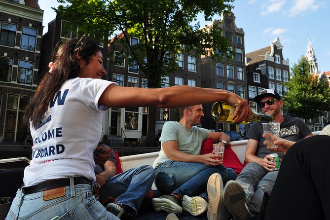 Amsterdam Canal Cruise With Live Guide and Unlimited Drinks - What the unlimited drinks really add
