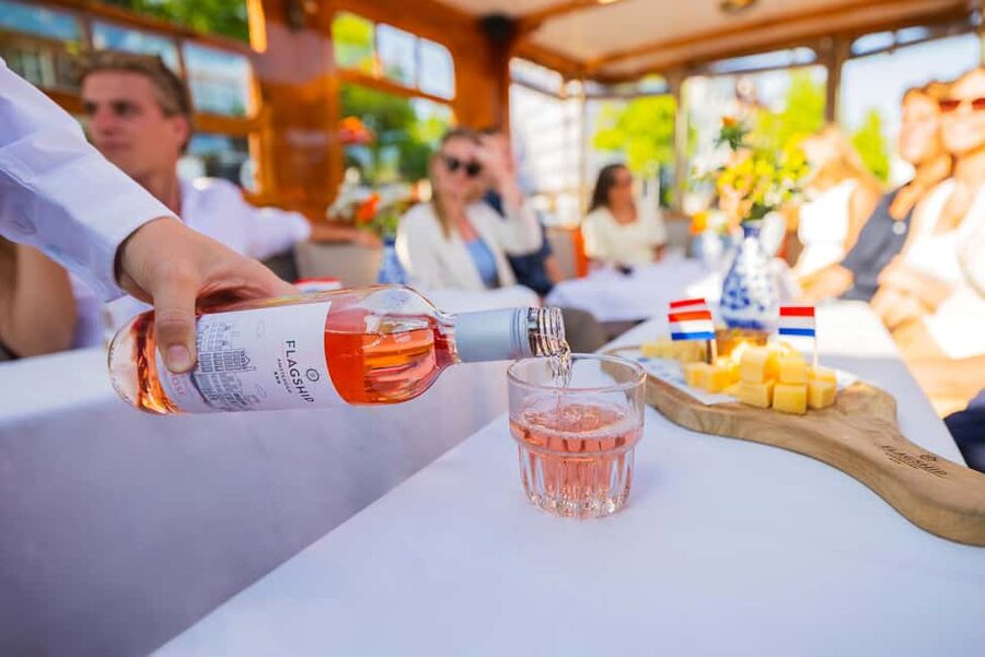 Amsterdam: Classic Saloon Boat Cruise with Cheese & Wine - The Skinny Bridge and Amstel River views