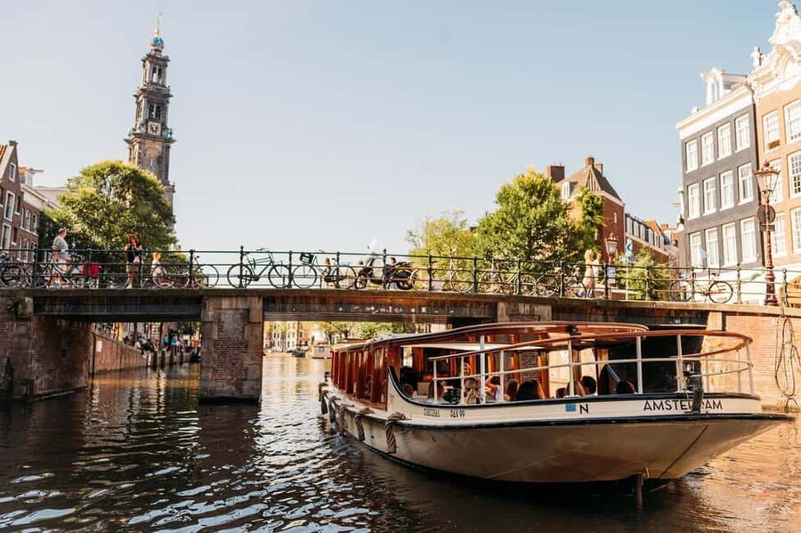 Amsterdam: Classic Saloon Boat Cruise with Cheese & Wine - Herengracht, the Golden Bend, and seven bridges