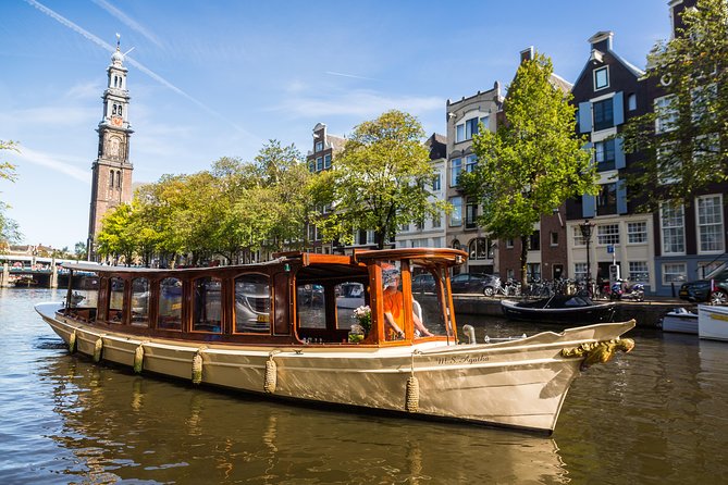 Amsterdam Classic Saloon Boat Cruise with Drinks and Cheese - A gentle start through Amsterdam’s canal belt