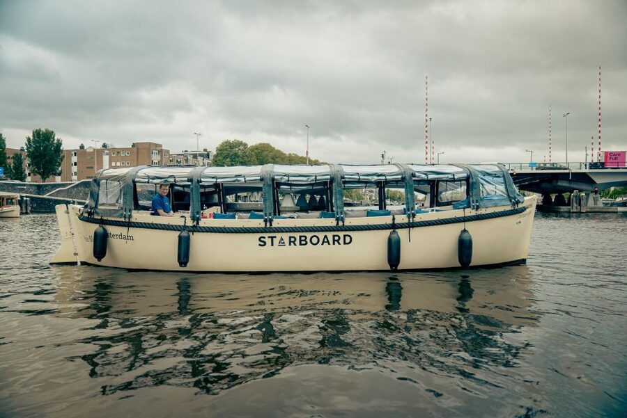 Amsterdam: Covered Canal Booze Cruise with Unlimited Drinks - Prinsengracht brings you back through classic Amsterdam