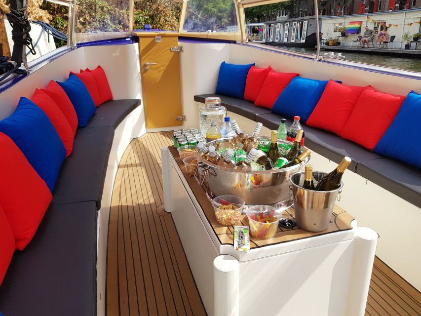 Amsterdam: Covered Canal Booze Cruise with Unlimited Drinks - What the covered boat is really like