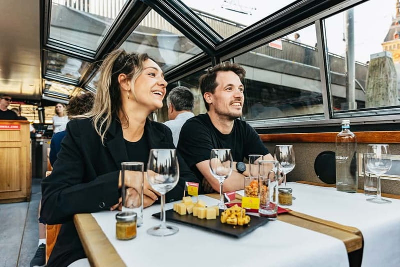 Amsterdam: Cozy Cheese & Wine Cruise Tasting Experience - Magere Brug and the Nighttime Views