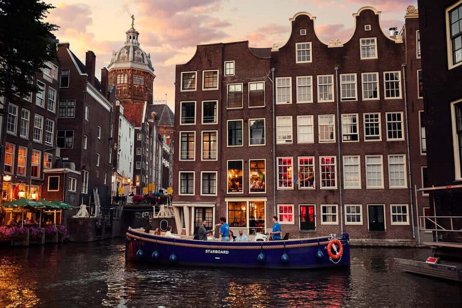 Amsterdam: Evening Candle Light Cruise With Wine & Cheese - Why Amsterdam’s canals work best after sunset