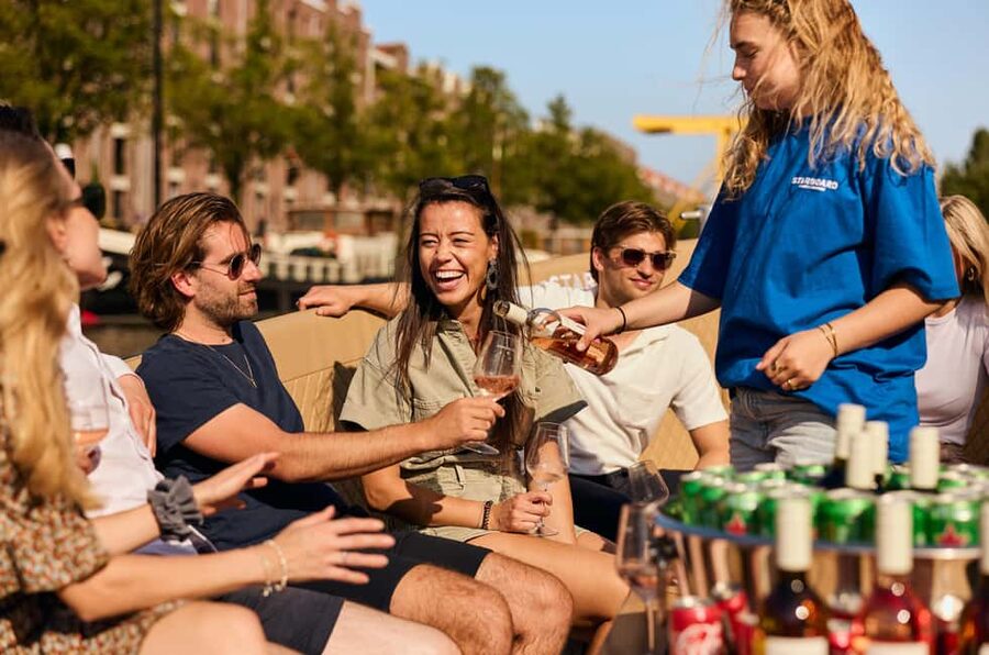 Amsterdam: Evening Candle Light Cruise With Wine & Cheese - What the covered boat feels like in Dutch weather