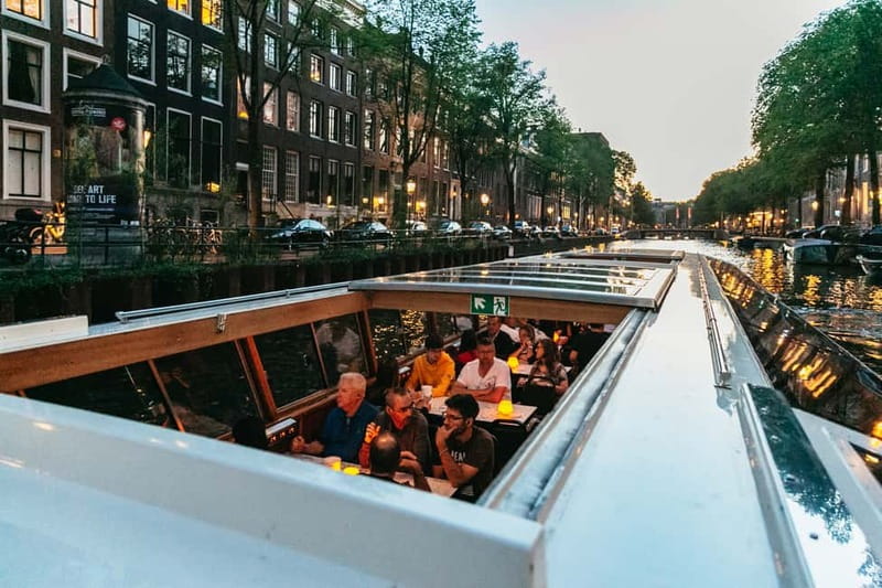 Amsterdam: Evening Cruise with Optional Wine and Snacks - From the Scheepvaartmuseum to the Magere Brug