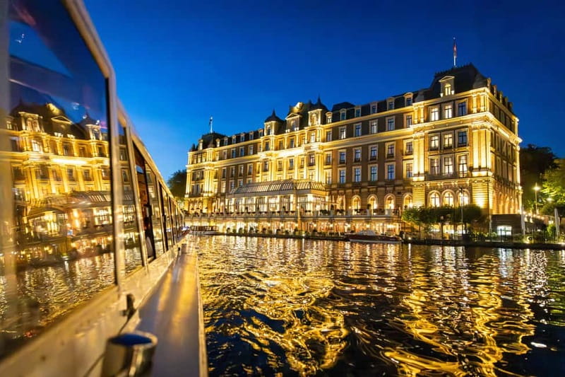 Amsterdam: Evening Cruise with Optional Wine and Snacks - Audio commentary, captains, and the pace on board