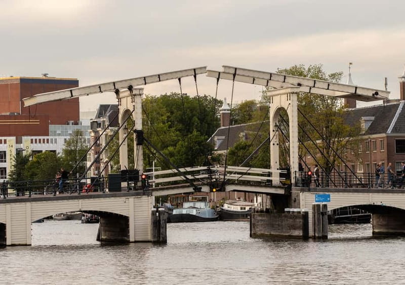 Amsterdam: German Canal Cruise with Unlimited Drinks Option - Maritime Amsterdam and the old Jewish Quarter