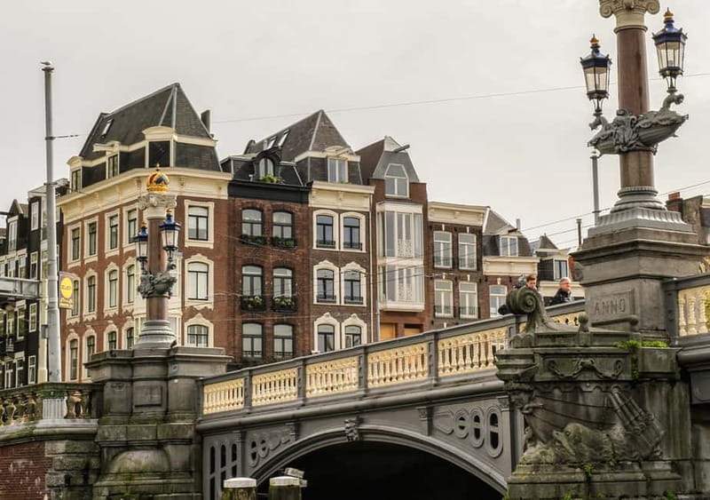 Amsterdam: German Canal Cruise with Unlimited Drinks Option - Muntplein, canals, and the return route
