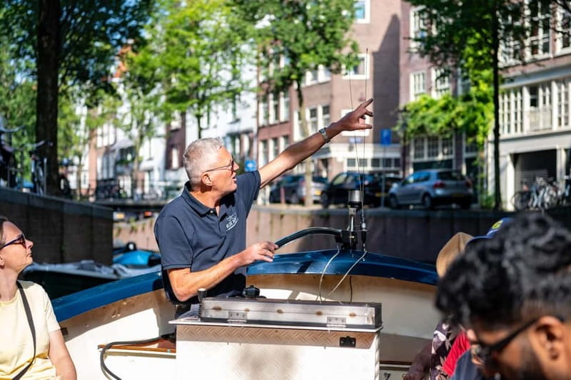 Amsterdam: Guided City Highlights Open Boat Canal Cruise - From the Hard Rock Cafe to central Amsterdam