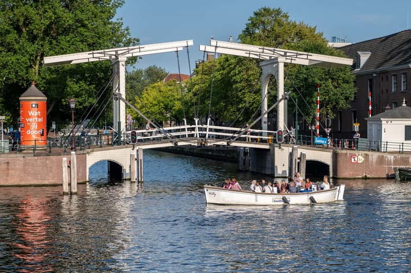 Amsterdam: Guided City Highlights Open Boat Canal Cruise - The Museum Quarter on the return route