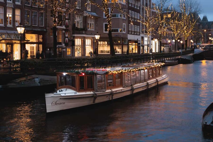 Amsterdam: Heated Canal Cruise with Unlimited Drinks & Bite - A route through old canals and major landmarks