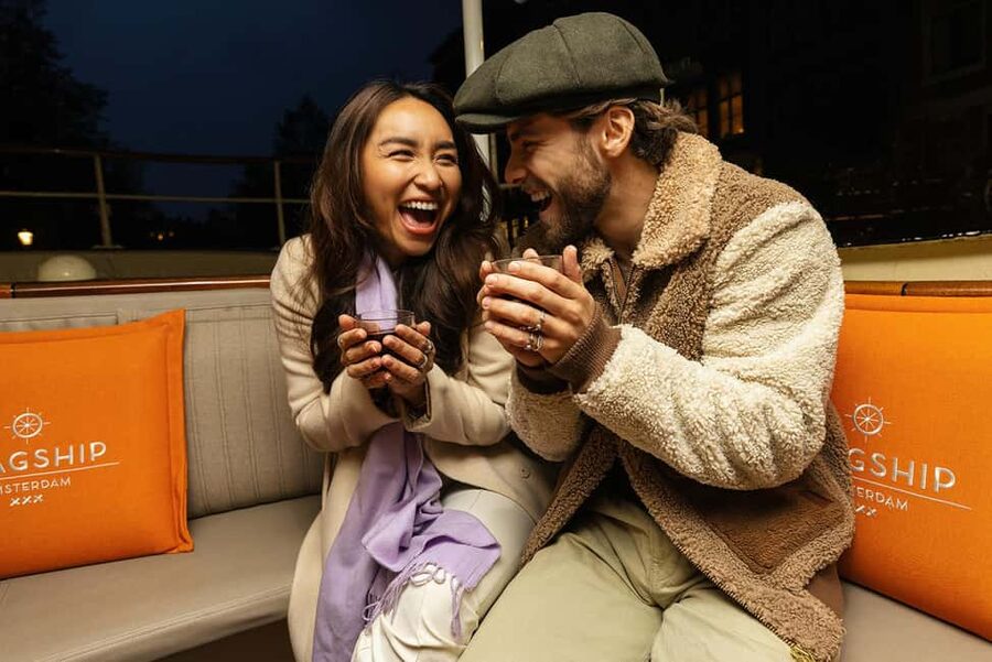 Amsterdam: Heated Canal Cruise with Unlimited Drinks & Bite - Seating, weather, and comfort on the water