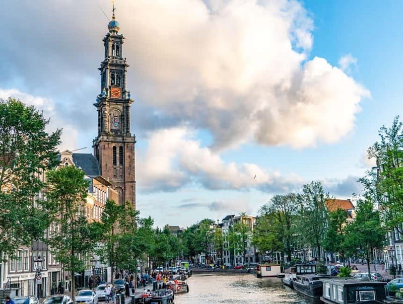 Amsterdam: Historic City Centre Canal Cruise - What the boat is like in sun, rain, and cold