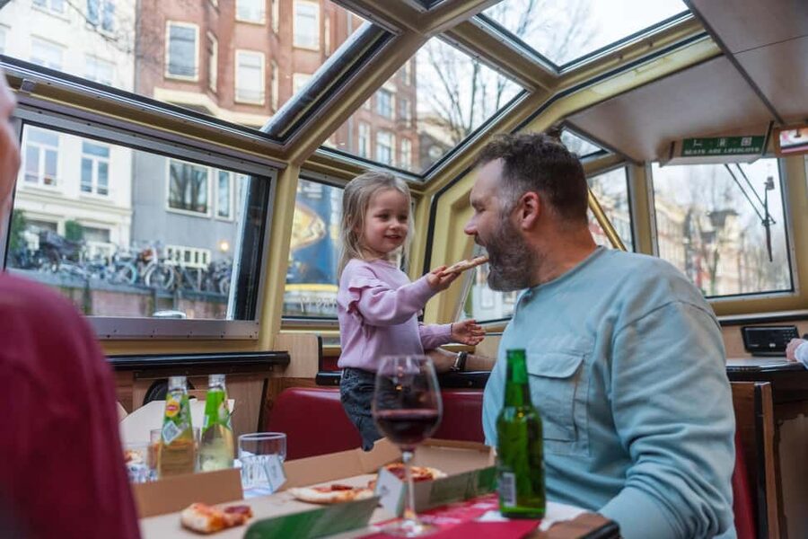 Amsterdam: Original Pizza Dinner Cruise + Unlimited Drinks - The Damrak departure and Amsterdam Centraal