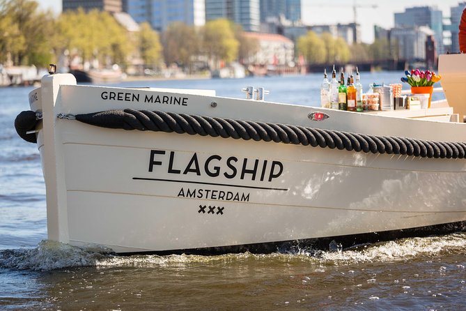 Amsterdam: Saloon Boat Cruise + Unlimited Drinks & Bite option - The Stopera and modern Amsterdam