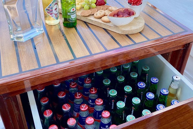 Amsterdam Small-Group Canal Cruise Including Snacks and Drinks - From the Amstel to the Red Light District