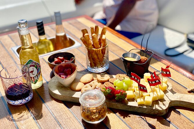 Amsterdam Small-Group Canal Cruise Including Snacks and Drinks - Bitterballen, stroopwafels, cheese, and the open bar