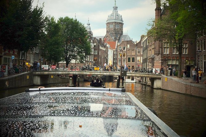 Amsterdam Small-Group Canal Cruise Including Snacks and Drinks - Captain stories are the heart of the ride