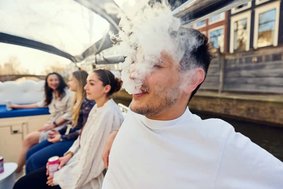 Amsterdam: Smoke & Cruise on covered Cannabis Boat With Bar - Centraal Station and Oudeschans