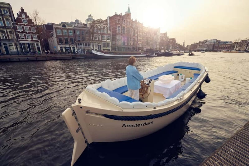 Amsterdam: Smoke & Cruise on covered Cannabis Boat With Bar - Weather, blankets, and the covered boat