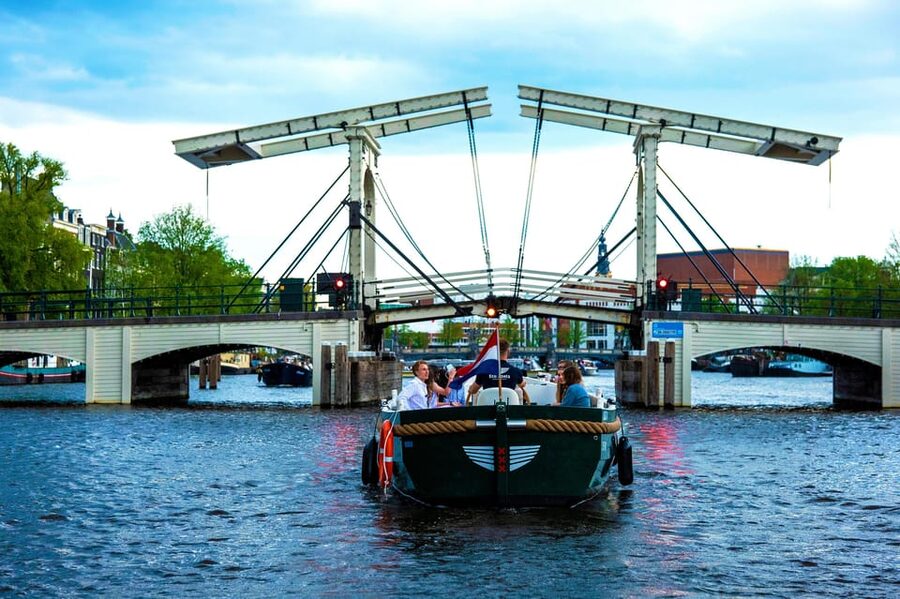 Amsterdam: The Newest Canal Cruise with Drink Option - Leaving Central Station for the old harbor