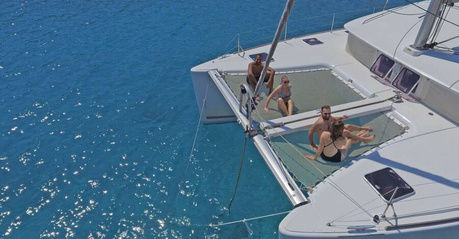 Athens: Riviera Catamaran Cruise with Meal and Drinks - The first swim stop near Voula