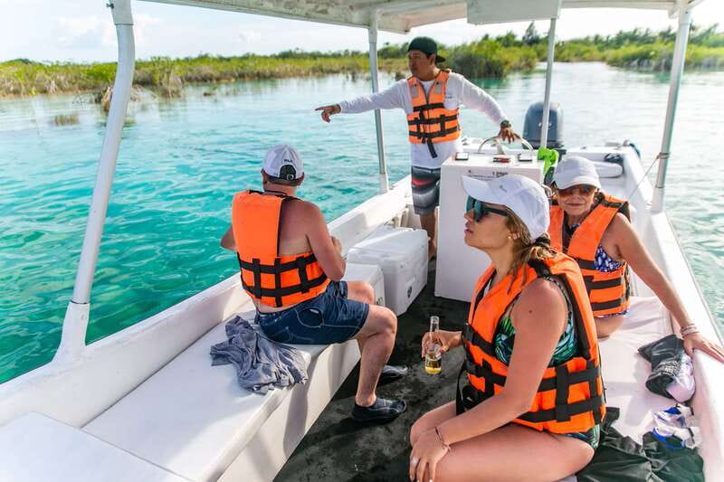 Bacalar: 3 Hour Boat Trip with Swimming & Drinks - Cenote Negro and the lagoon’s changing depth