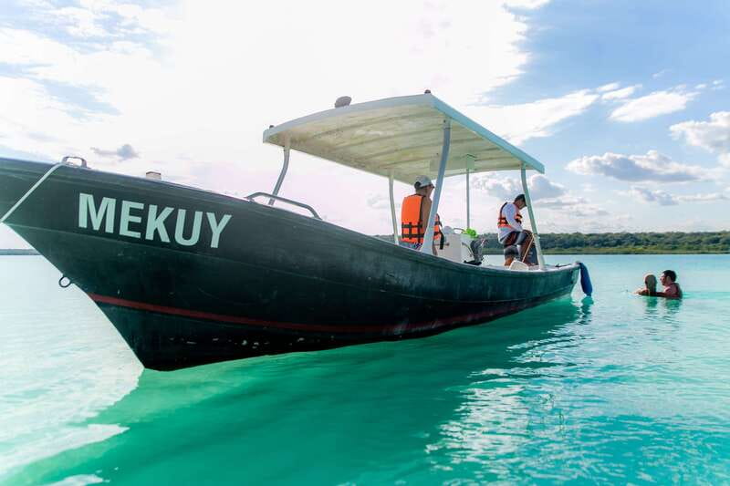 Bacalar: 3 Hour Boat Trip with Swimming & Drinks - Cenote Esmeralda and the first blue-water views