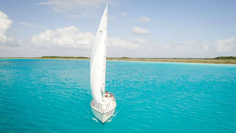 Bacalar: Group Sailing Trip with Swimming and Drinks - Cenote Negro and the Lagoon’s Changing Colors