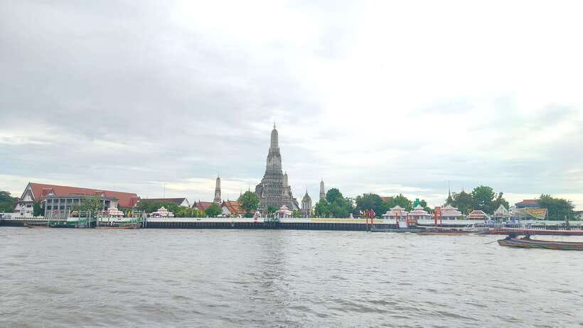 Bangkok: Longtail Boat Canal Tour to Wat Arun - Returning toward the Chao Phraya River