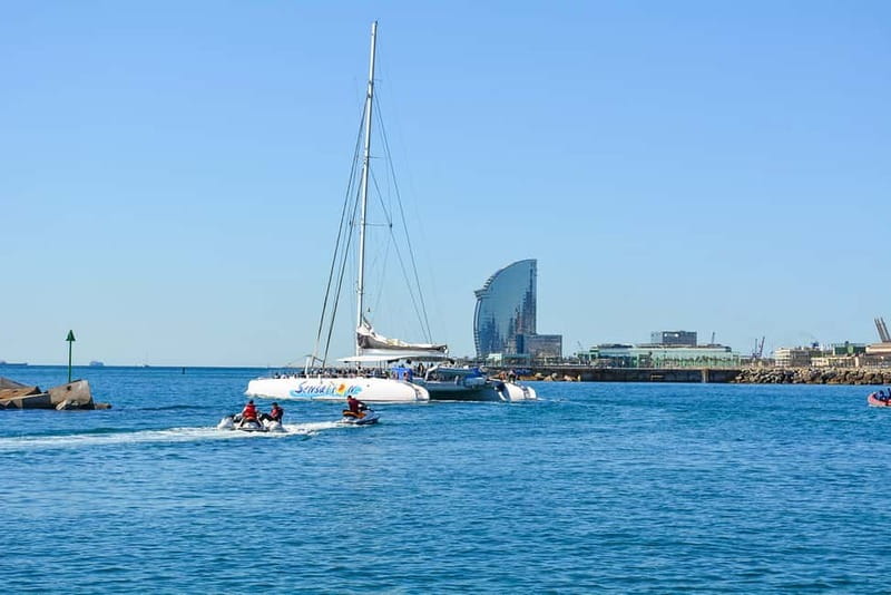 Barcelona: Catamaran Party Cruise with BBQ Meal - Badalona swimming stop: fun, but keep your expectations realistic