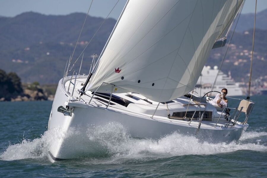 Barcelona: Midday or Sunset Sailing with Open Bar and Snacks - From harbor traffic to open Mediterranean water