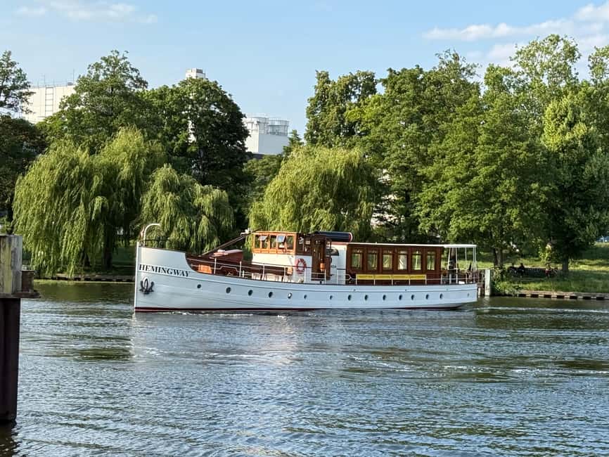 Berlin: Historic Boat Sightseeing City Center Tour - Commentary, music, and onboard service